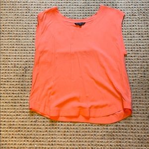 Peach sleeveless blouse